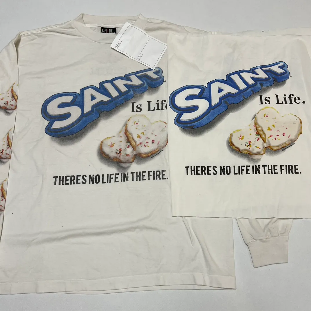 Printing proofing SAINT Mxxxxxx HEART COOKIES L/S TEE/WHT Love Oreo printed long sleeves Off-white S-XL Customized co-branded main mark/wash mark Correct version Ready-made garments washed and distressed Full of VINTAGE feeling Top-notch printing technology Perfect restoration
